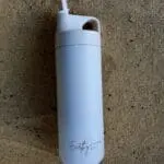 Reusable water bottle for hydration during labour, featuring an easy-to-use flip top for convenience.