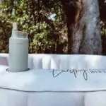 Ergonomic water bottle designed to easily fit in hand, ensuring quick hydration during labour.