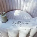 Lightweight water bottle for convenient access to fluids during childbirth, promoting comfort and well-being.